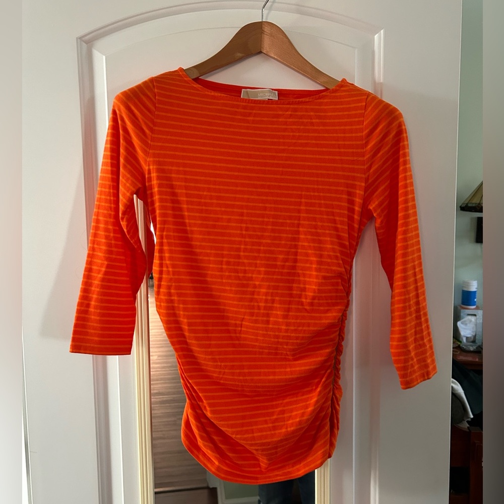 Michael Kors three-quarter length top with side zipper.  Size Petite/Small